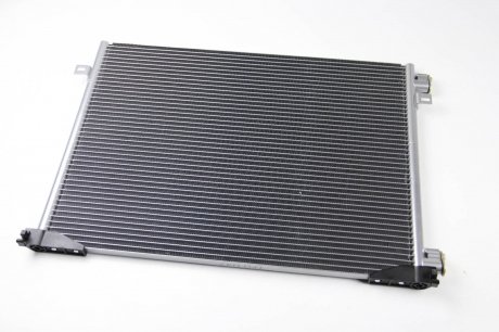 Радиатор кондиціонера THERMOTEC KTT110228 (фото 1)